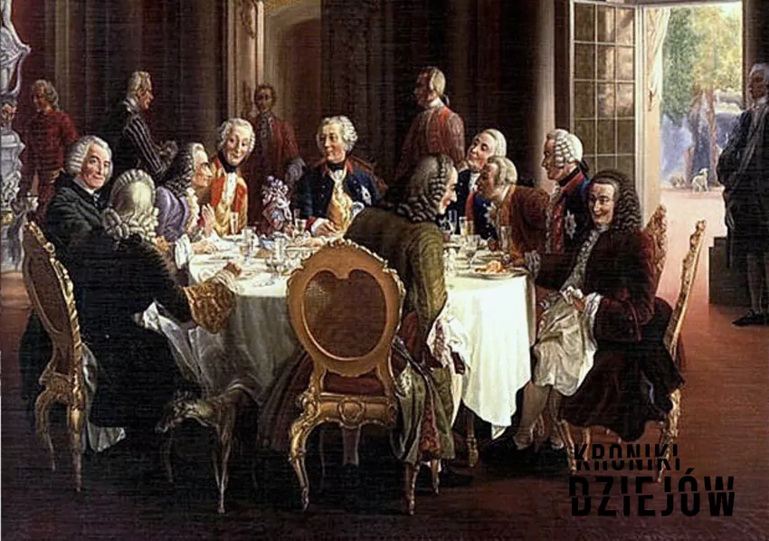 Absolutyzm oświecony, czyli orientacyjne daty, idea, założenia oraz najważniejsze reformy państwa - fot. domena publiczna Fryderyk II spotyka się z filozofami przy okrągłym stole na obrazie Adolph Menzela, a także absolutyzm oświecony