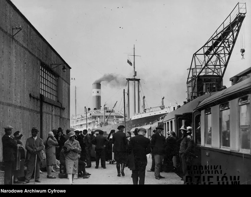 Pociąg i statek czekający na emigrantów